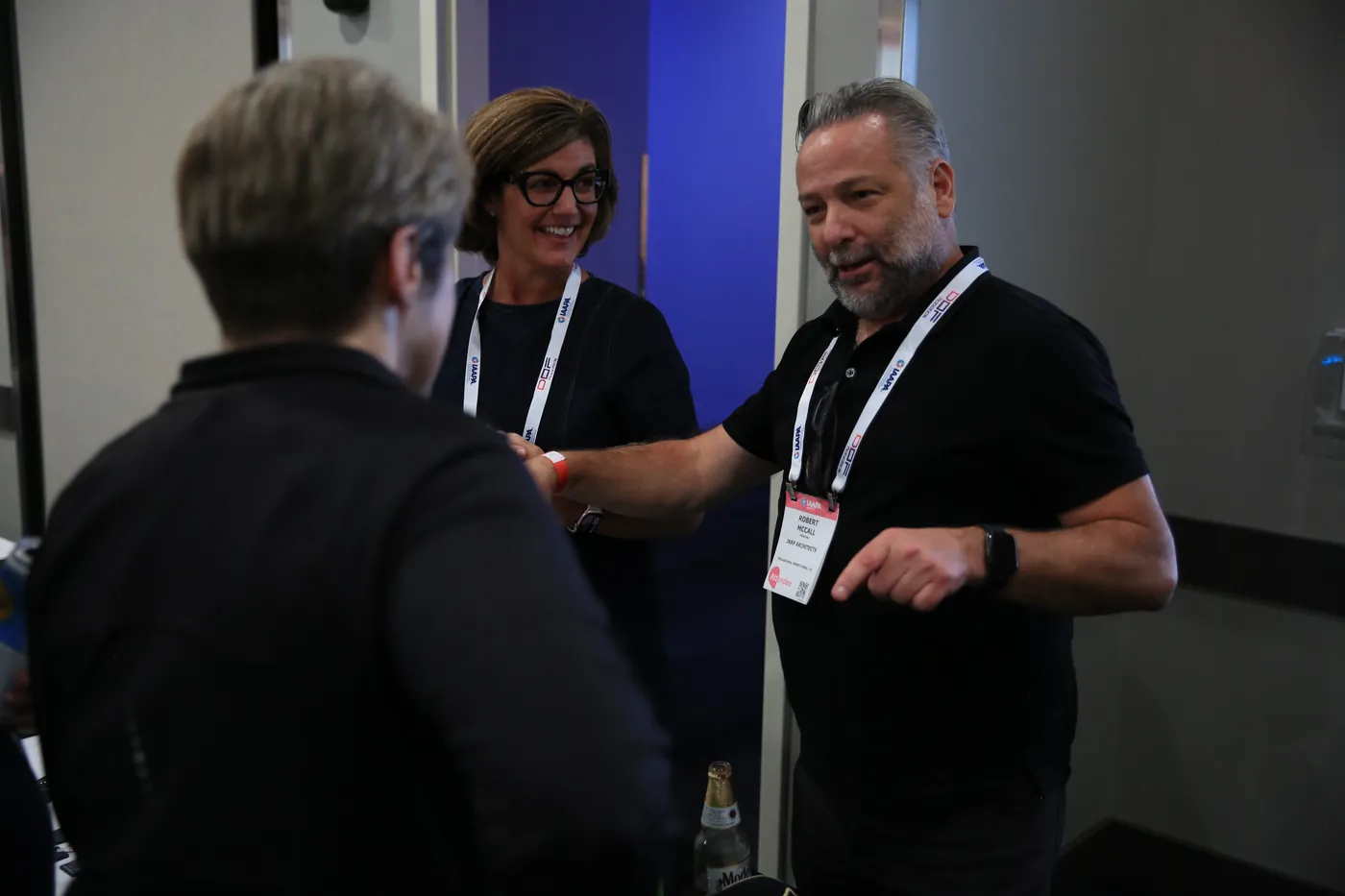 Industry guests in IAAPA badges greeting each other at The Big Show Wrap-Up